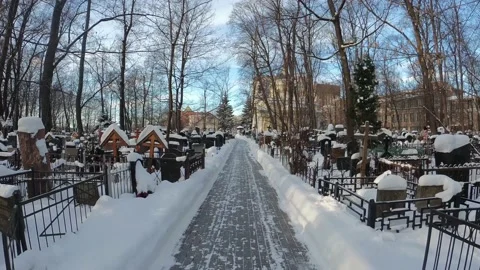 Snow-covered road to the cemetery Stock Footage