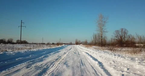 Snow covered road Stock Footage 168911831