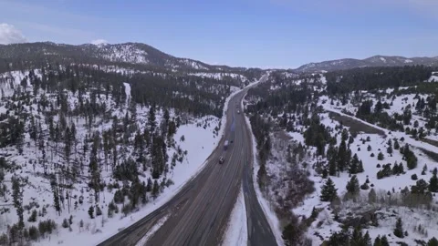 Snow covered road in mountains Stock Footage 248002445