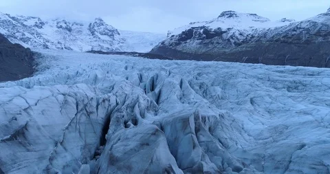 Snow covered rock formations and snowcapped rocky mountains during winter Stock Footage 116262500