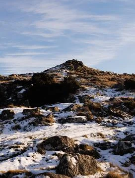 Snow covered rocks Stock Photos