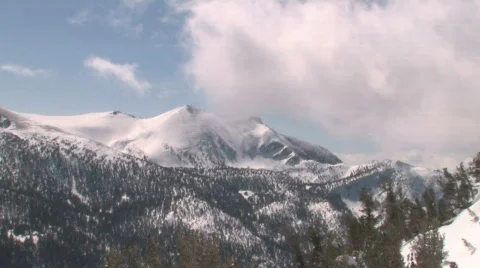 Snow Covered Rocky Mountains in Lake Tahoe Stock Footage