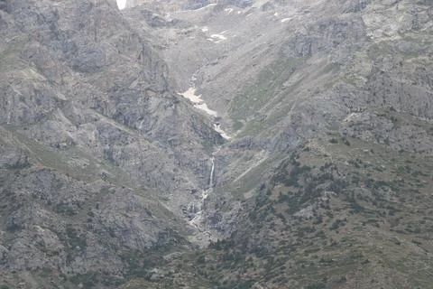 Snow-Covered Rocky Terrain with Cascading Waterfall in Sultanabad Bashu Valley Stock Photos