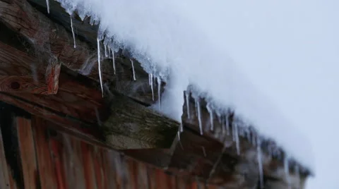 Snow covered rooftop of house during snowfall Stock Footage 64861010