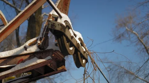 Snow-covered Rope of an Abandoned Cableway Overgrown with Liana Stock Footage 101715418