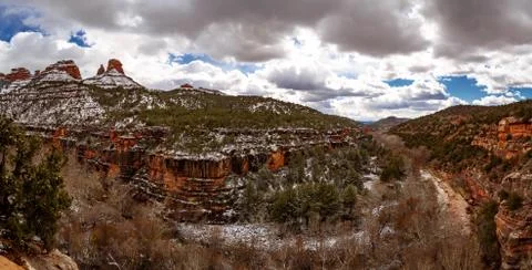 Snow Covered Sednoa Arizona Canyon with Red Rocks Panorama Stock Photos