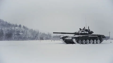Snow-covered shooting range field. Tank equipment testing Stock Footage 115861040