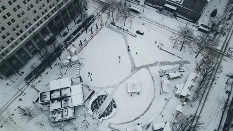 Snow covered square with light rail in Portland Oregon Stock-Footage 162848830