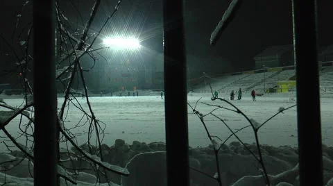 Snow-covered stadium and training of young hockey players. Stock Footage 59049287