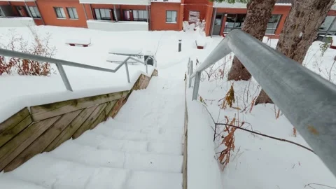 Snow Covered Staircase Between Buildings Stock Footage 323487033