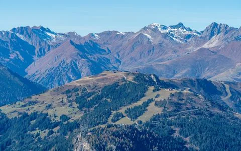 Snow covered summit of Lizumer Reckner in the background with the ridge of Stock Photos