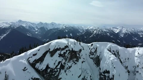 Snow covered summit in the Winter, Drone View Stock Footage 289565587