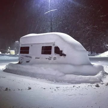 Snow covered van Stock Photos