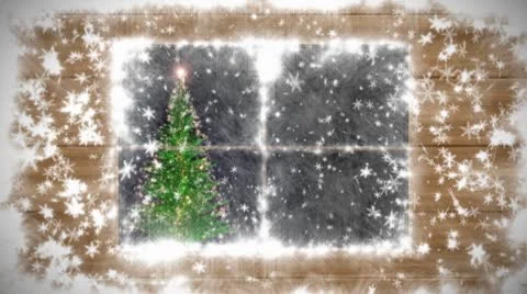 The snow-covered window, falling snow and New Year tree Stock Footage 8950799