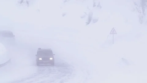 Snow-covered winter road. Blizzard. Bad weather. Stock Footage 104797509
