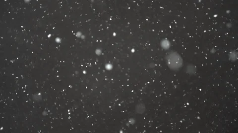 Snow crops slowly falling towards the camera, repeatable Stock Footage 119792823