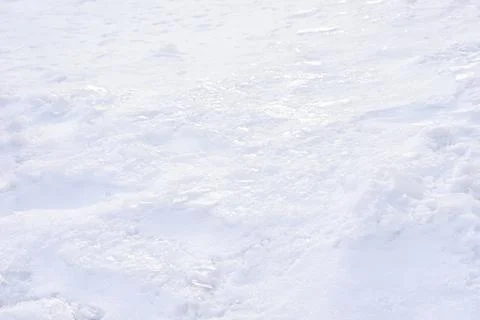 Snow crust - a layer of ice over a layer of snow. Texture, pattern, winter ba Stock Photos