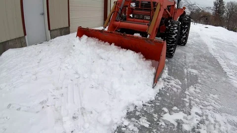 Snow Deep On Driveway Tractor Moving Snow 4k Stock Footage 102413994