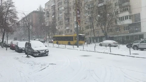 Snow disaster, bus having troubles with moving uphill Stock Footage 127060363