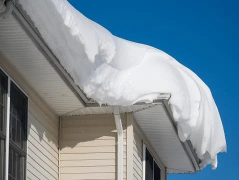 Snow drift on roof Stock Photos