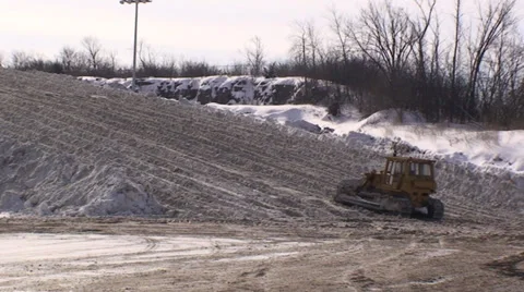 Snow dump with bulldozer - #32 Stock Footage 34776129