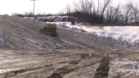 Snow dump with bulldozer. #34 Stock Footage 34776098