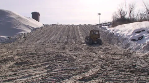 Snow dump with bulldozer. #38 Stock Footage 34776071