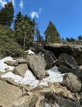 Snow-dusted mountain trail Stock Photos