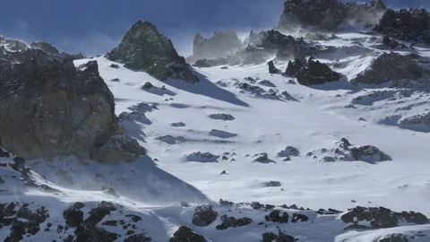 Snow dusting blows over mountain range on Aconcagua in Argentina Stock Footage 91047302