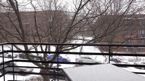 Snow fall from a balcony Stock Footage 123178074