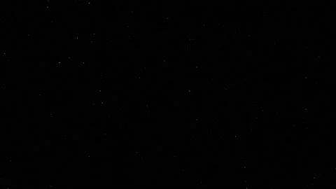 Snow fall on black background Stock Footage 144675367