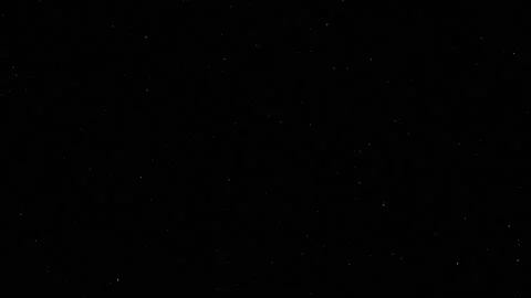 Snow fall on black background Stock Footage 144677054