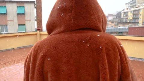 A snow fall down on a coat Stock Footage 86514430