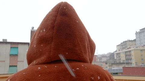 A snow fall down on a  synthetic fur coat Stock Footage 86514822