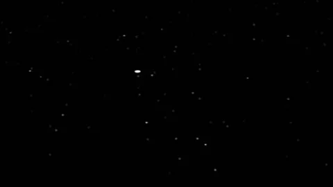 Snow fall in night on black background Stock Footage 156510661