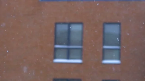 Snow Fall in Slow Motion Apartment Windows Background Stock Footage 88256057