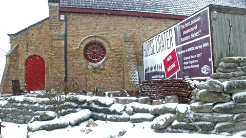 Snow fall on World War One battlefields : Hooge Crater Museum, Ypres, Belgium Stock Footage 101844263