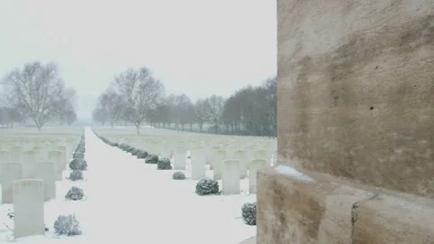 Snow fall on World War One battlefields : Hooge Crater Cemetery, Ypres, Belgium Stock Footage 102167447