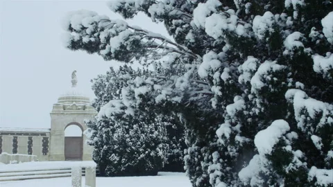 Snow fall on World War One battlefields : Tyne Cot Cemetery, Ypres, Belgium Stock Footage 102203292