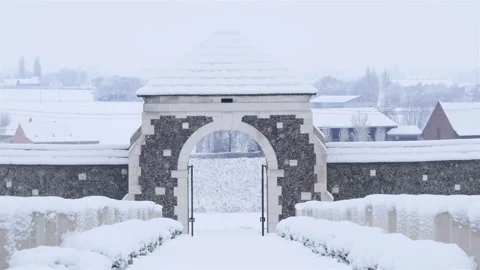 Snow fall on World War One battlefields : Tyne Cot Cemetery, Ypres, Belgium Stock Footage 102207410