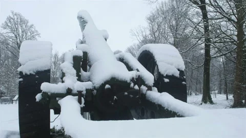 Snow fall on World War One battlefields : Tyne Cot Cemetery, Ypres, Belgium Stock Footage 102220205