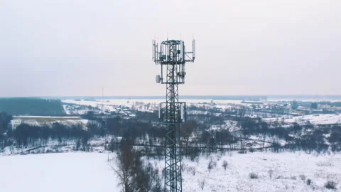 Snow falling at 5g antenna in slow motion. Telecommunication tower Stock-Footage 146838751
