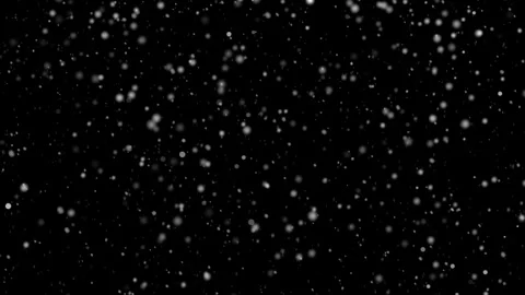 Snow falling against black background Stock Footage 337759691
