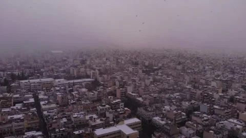 Snow Falling in Athens Flight Stock Footage 290231096