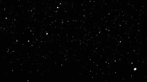 Snow falling on black background Stock Footage 131588198