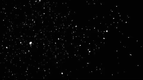 Snow falling on black background Stock Footage 131592744