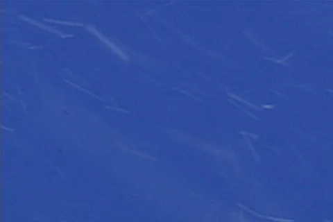 Snow falling blue background dif focus Video stock 121542255