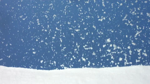 Snow falling with blue background, slow motion Stock Footage 62345629