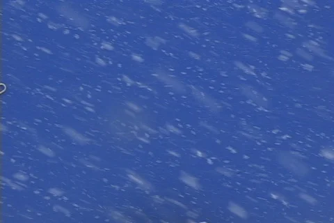 Snow falling blue background- snow globe effect Stock Footage 121542258