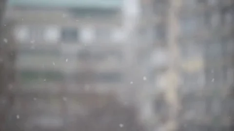 Snow falling on blurred urbank background Stock Footage 69251824